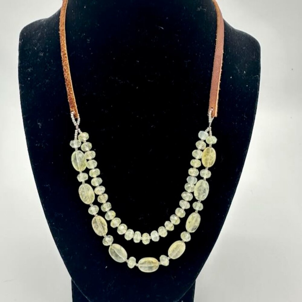 Green gemstone and leather necklace